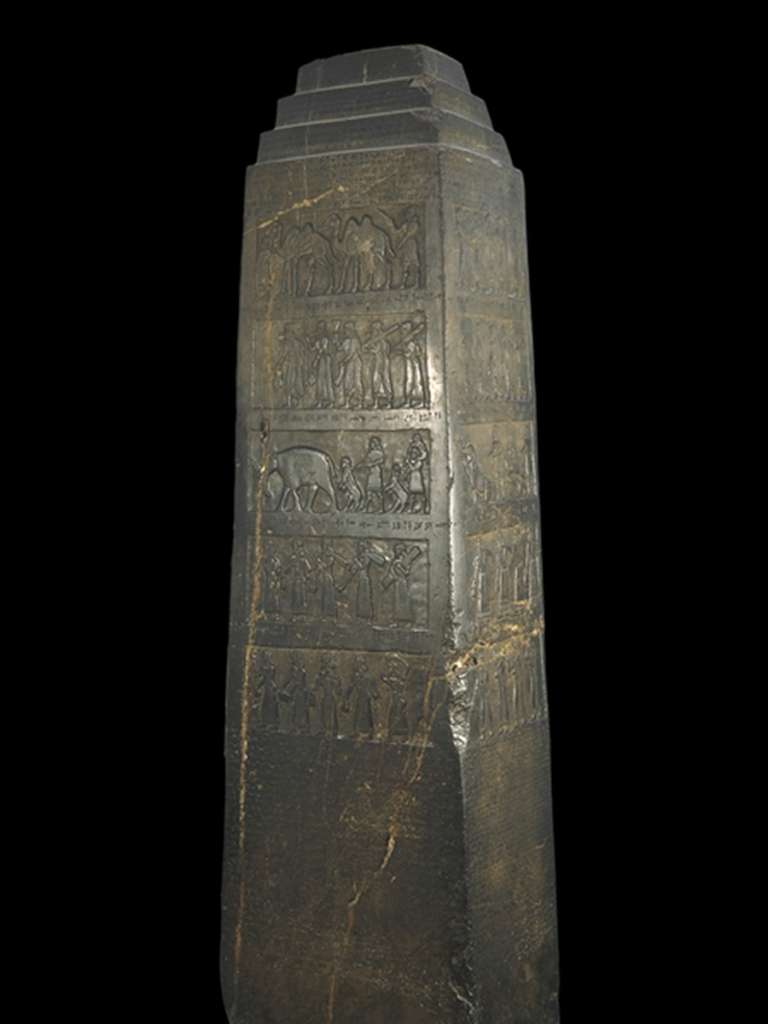 British Museum Top 20 14-1 Black Obelisk 14. Black obelisk of Shalmaneser III, 825BC, Nimrod (northern Iraq), 198cm high. The Black Obelisk was erected as a public monument in 825BC at a time of civil war. The relief sculptures on the black alabaster glorify the achievements of King Shalmaneser III (reigned Assyria 858-824 BC) and his chief minister. It lists their military campaigns of 31 years and the tribute they exacted from the kings they had conquered, including camels, monkeys, an elephant and a rhinoceros. There are five scenes of tribute, each of which occupies four panels round the face of the obelisk.